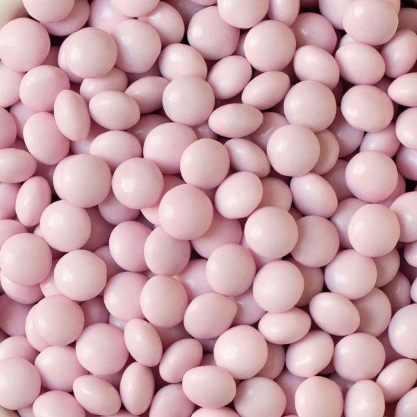 Melkesjokoladeperler/linser - Rosa - 80 g Melkesjokoladeperler/linser - Rosa - 80 g